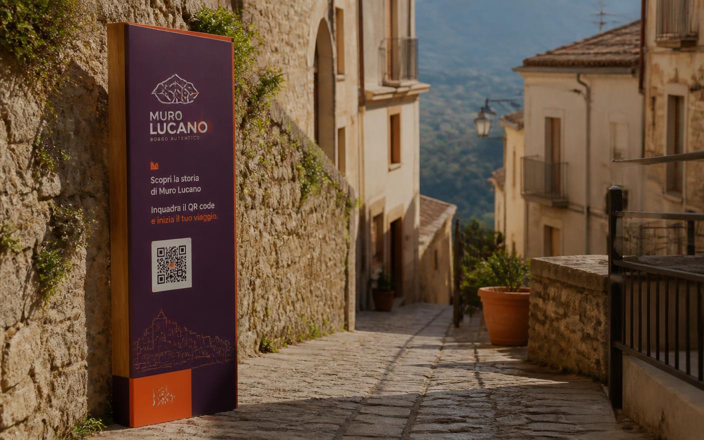 Totem BorgoBo con QR code in un vicolo di Muro Lucano